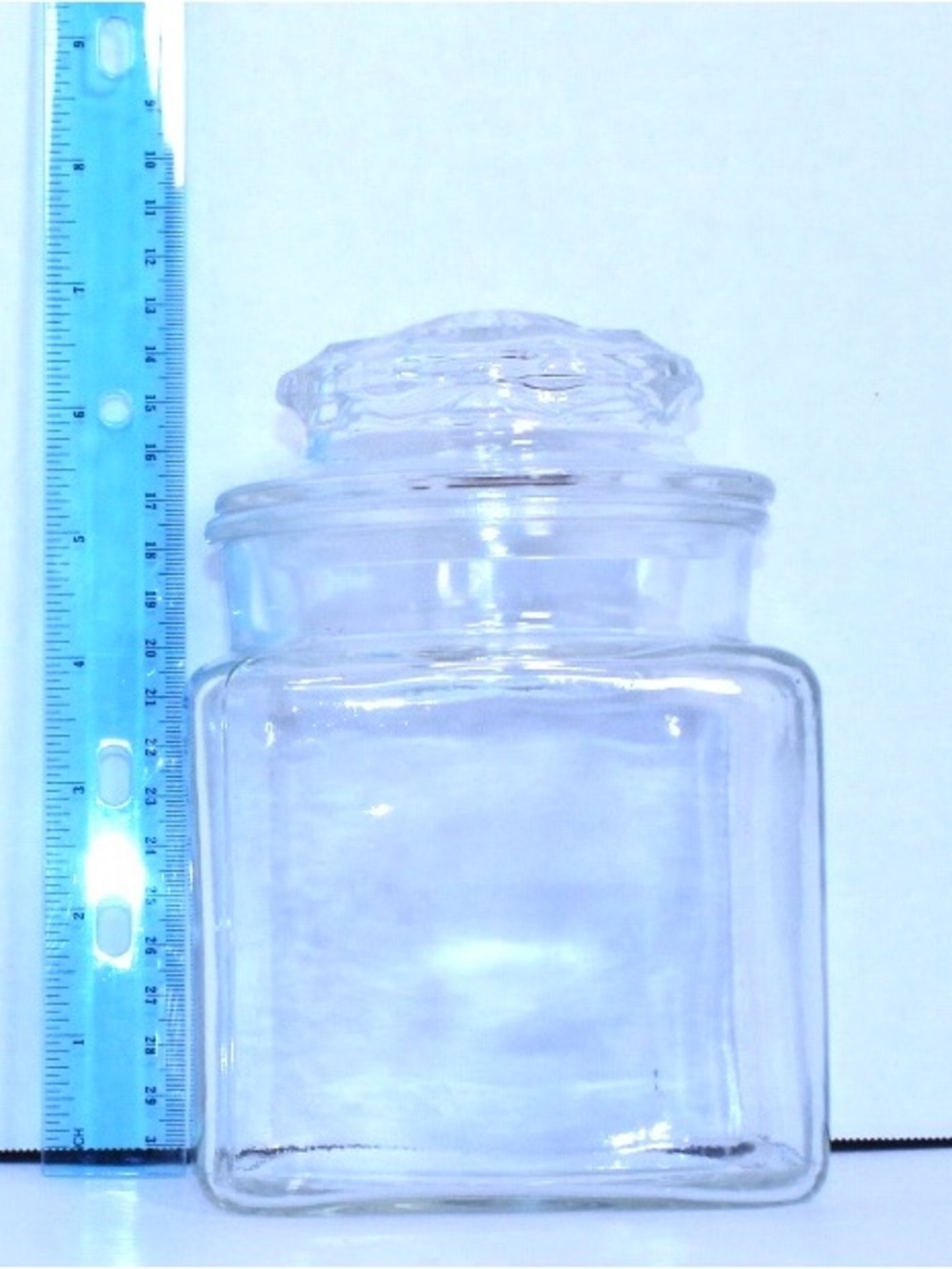 Clear Glass Apothecary Jar with Sunburst Pattern Lid